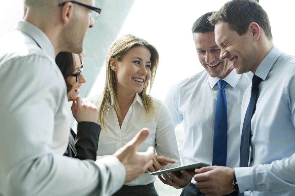 Business professionals discussing a project together