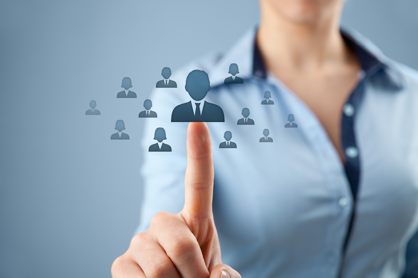 Human resources professional interacting with a network of people icons